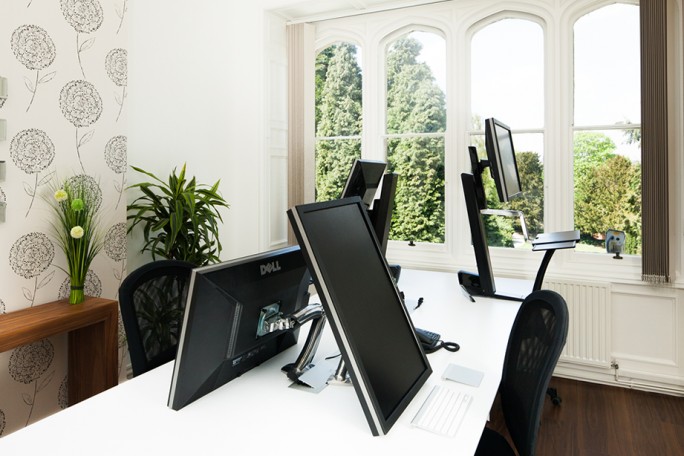 Ergotron Workfit-S at CRE's offices